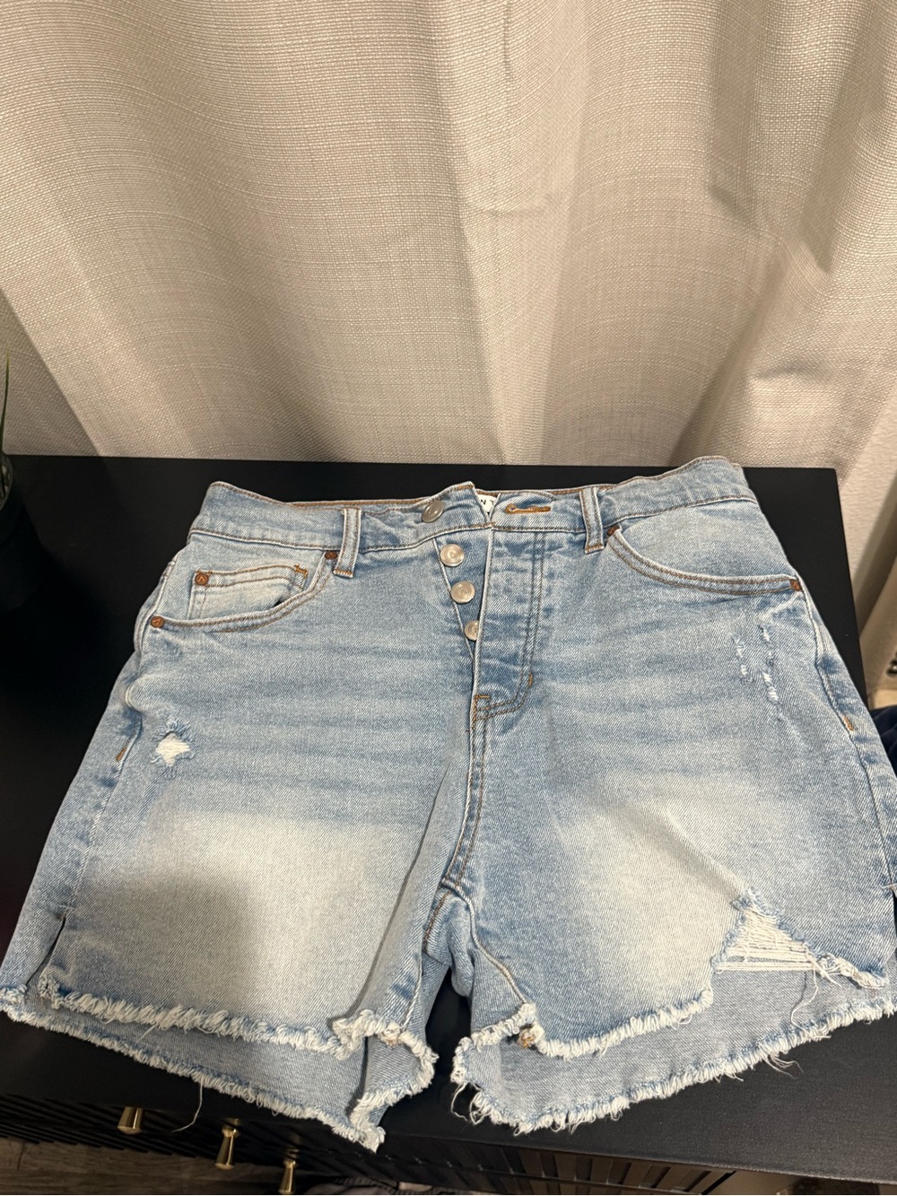 And now this brand-Light Blue Distressed Denim Shorts